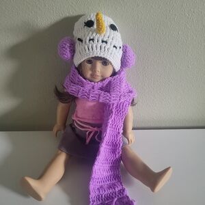 Hat and scarf.  Works with 18 inch dolls American Girl Doll not included.